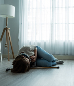 Woman Laying On The Ground After A Fall