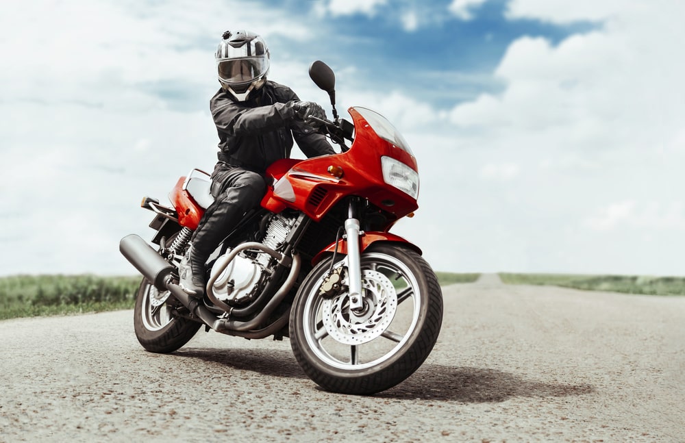 Person On A Red Motorcycle